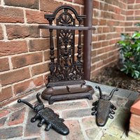 Cast Iron Umbrella Stand & Two Cast Iron Beetle Boot Jacks