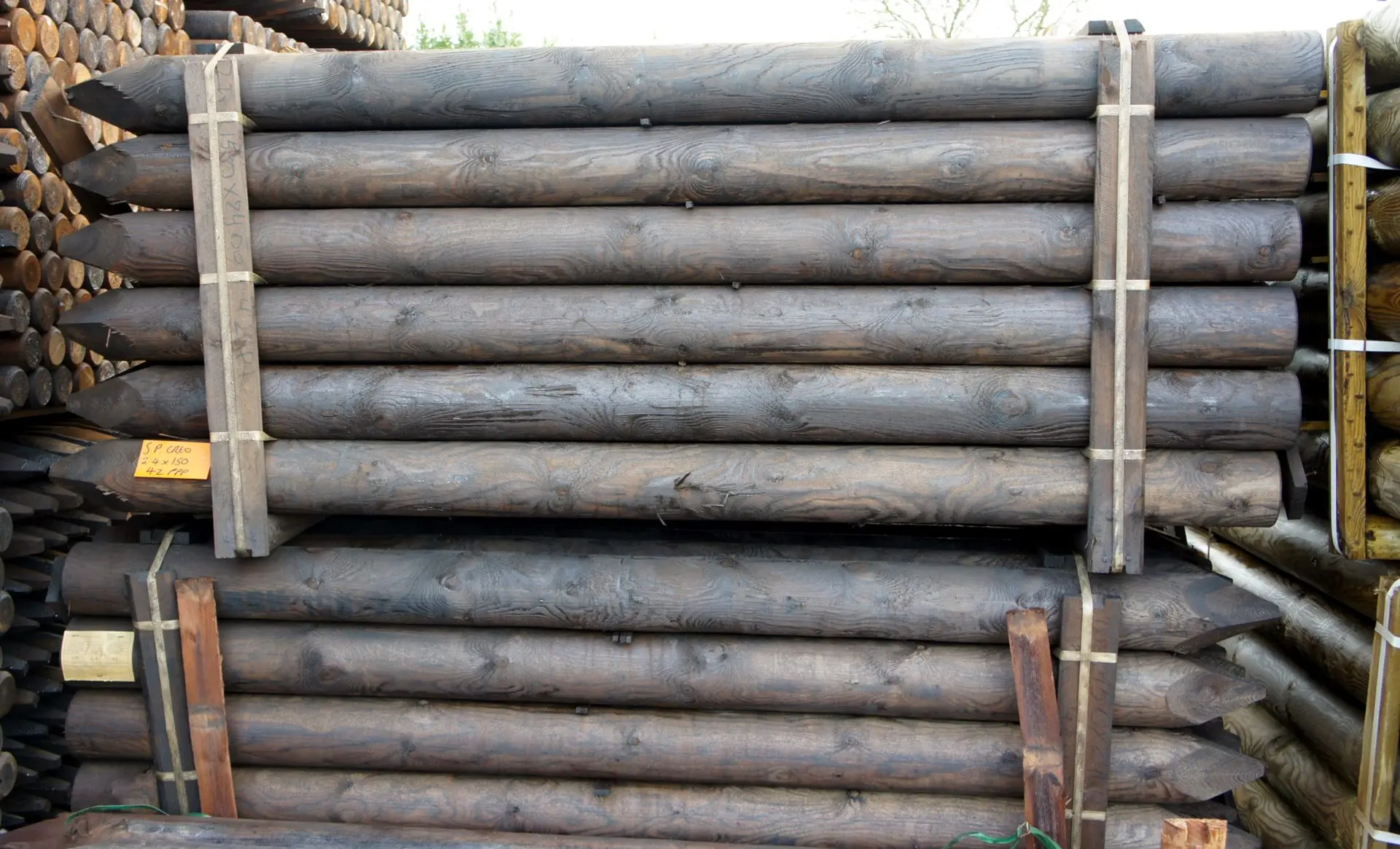 UK 2.4m x 150mm Creosoted Machined Round Strainer Post Pointed