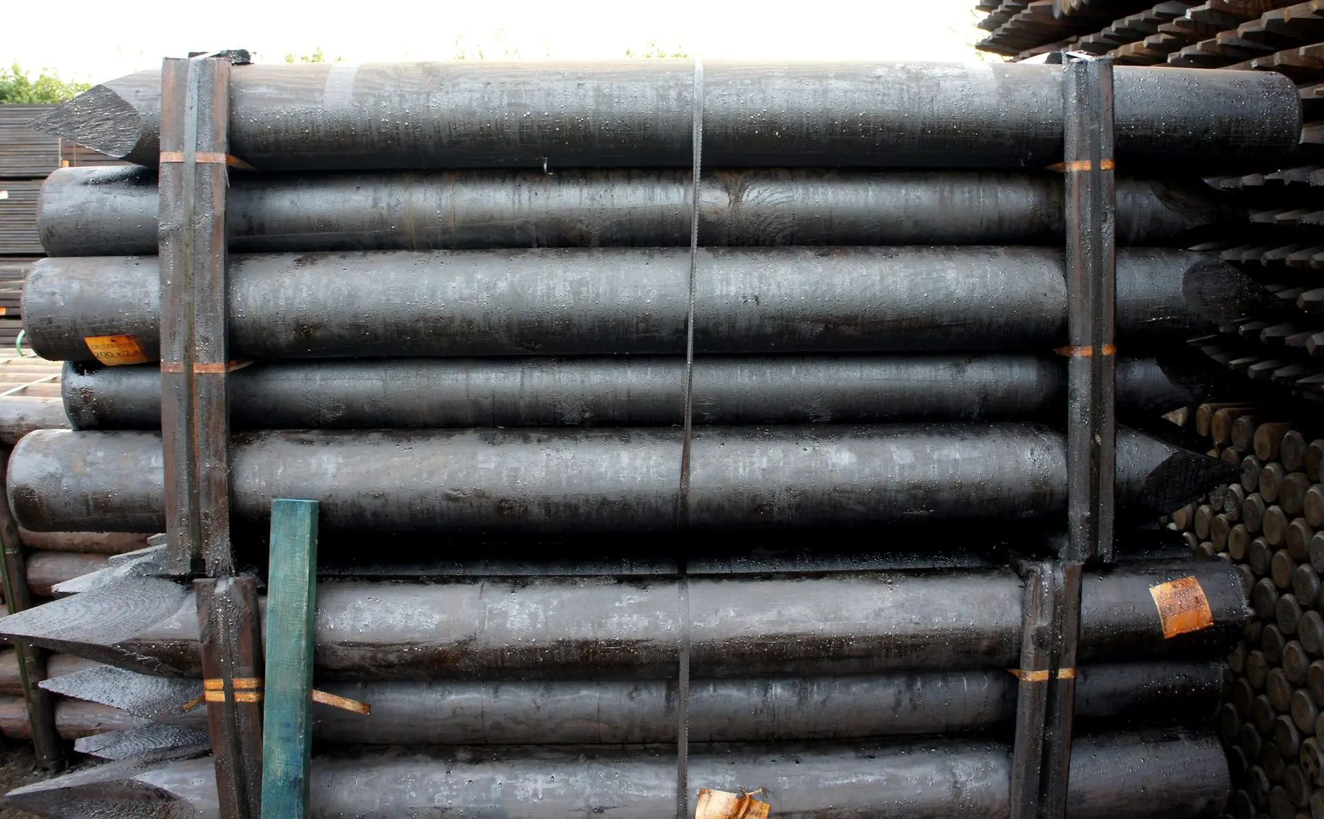 UK 2.4m x 200mm Creosoted Machined Round Strainer Post Pointed